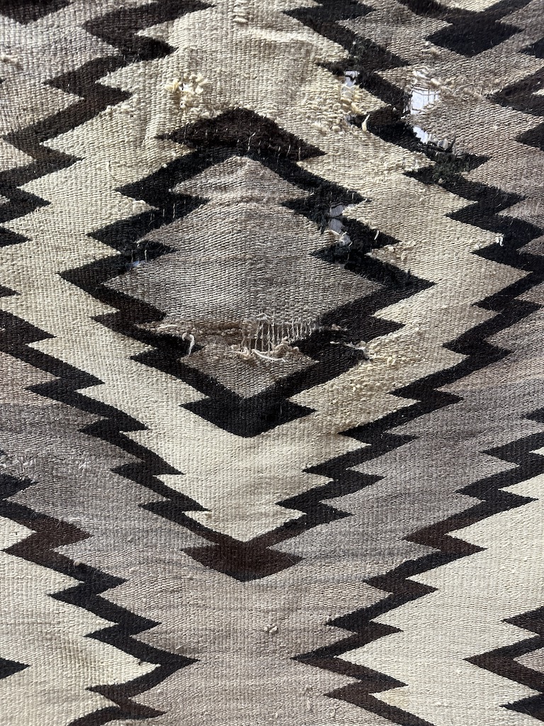 antique navajo damaged by moth , moth damage navajo repair novato
