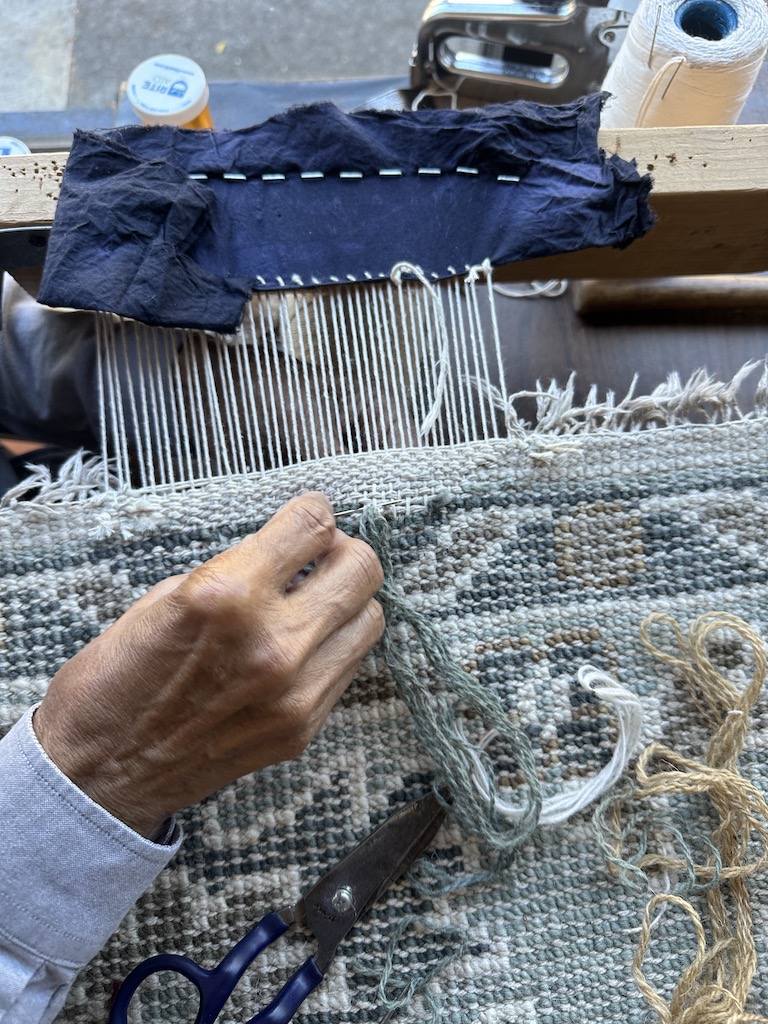Handmade rug fringe repair in Oakland, CA – artisan reweaving and restoring rug edges with new yarn