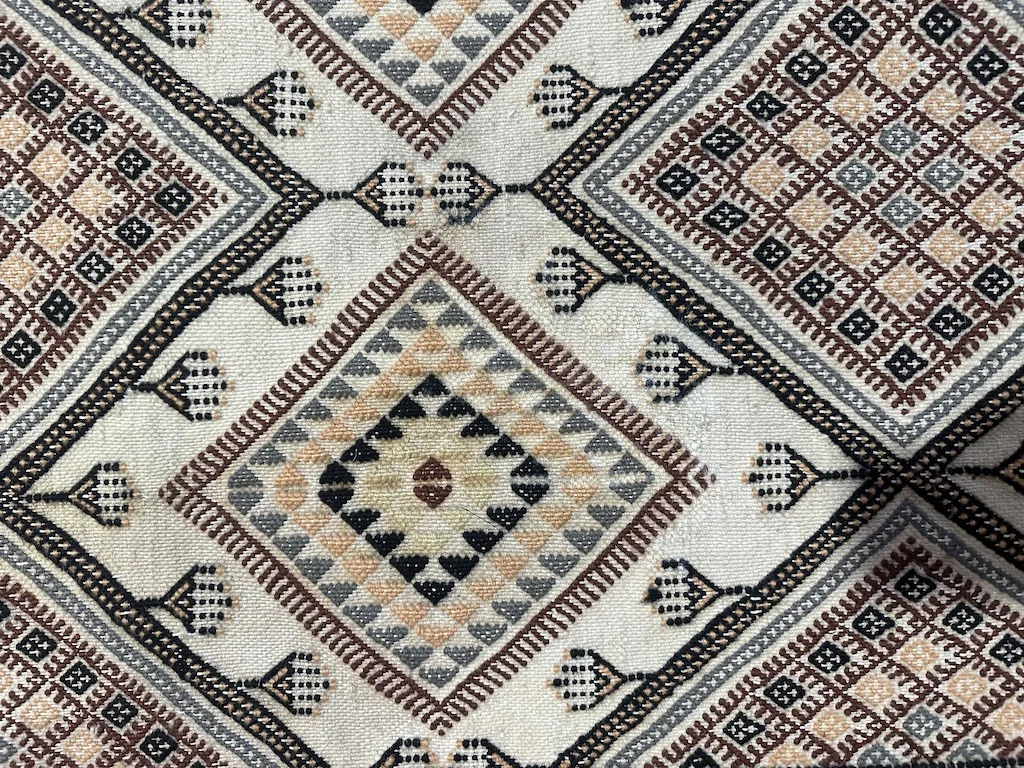 “kilim cleaning san rafael, Flatweave kilim rug texture with multi-color geometric design, ideal example for moth treatment and handmade rug restoration.